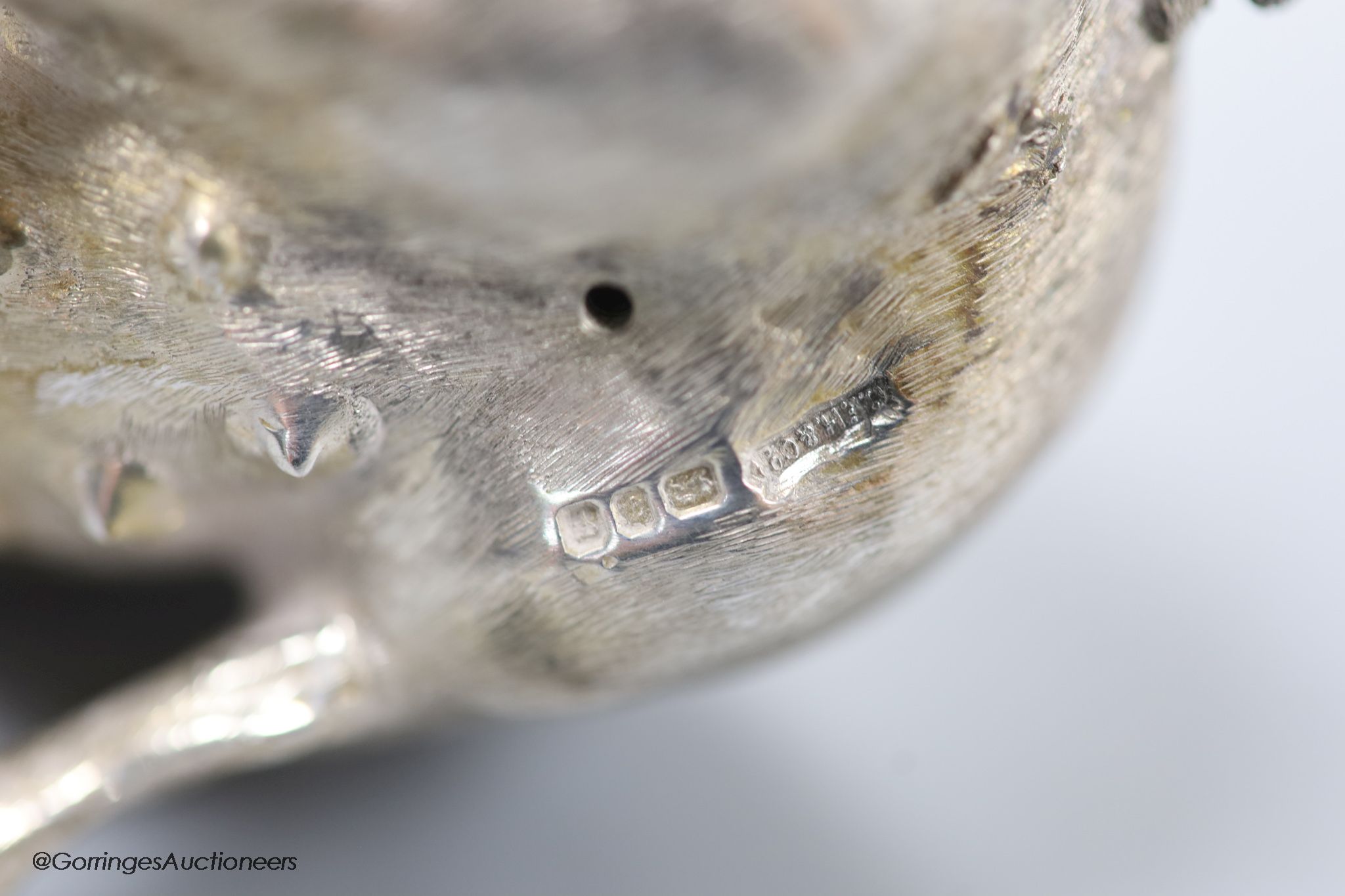 A modern silver miniature model of a seated pig, C.F.H & Co, London, 1993, height 65mm, 302 grams.